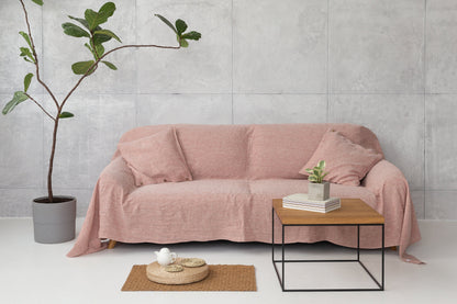 Baby blue linen couch cover by Magenta Sugarplum, stylish home decor for protecting and decorating a sofa.