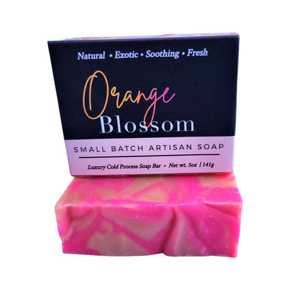 Yellow Shadow Orange Blossom Soap for bath and beauty, featuring a vibrant orange color and floral scent, in a natural setting.