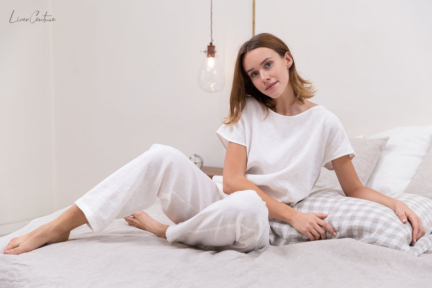White linen pajama set by Magenta Sugarplum, natural linen sleepwear with a relaxed fit and comfortable design for lounging and sleeping.
