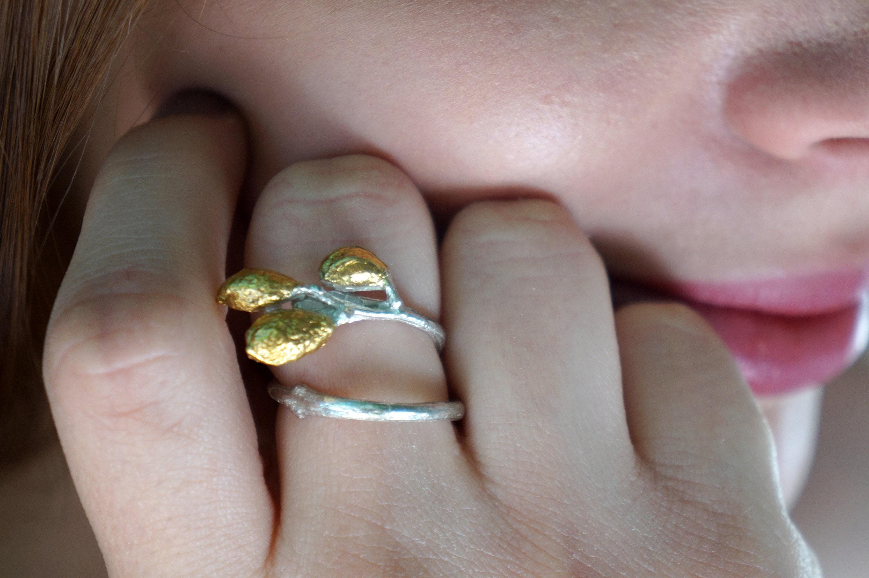 Adjustable Sterling Silver Leaf Ring with handmade olive branch design from Beige Briseis jewelry collection.