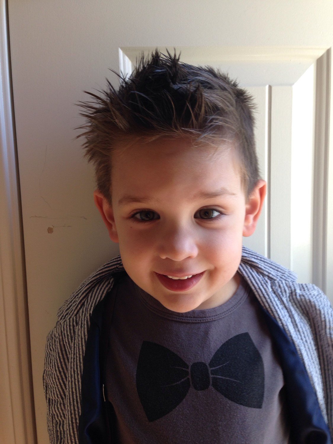 White Smokey organic hair wax for babies, children, and adults, shown in a natural hair styling setting.