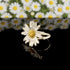 Handmade Daisy Ring with real flower set in recycled sterling silver, showcasing delicate floral jewelry design.