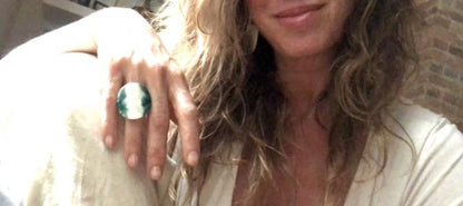 Adjustable handmade ceramic cocktail ring in teal by Azure Nesoi, featuring a bold statement jewelry design.