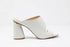 Apricot Hercules Melanie heels with stylish design, featuring pointed toes and ankle straps, shown on a neutral background.