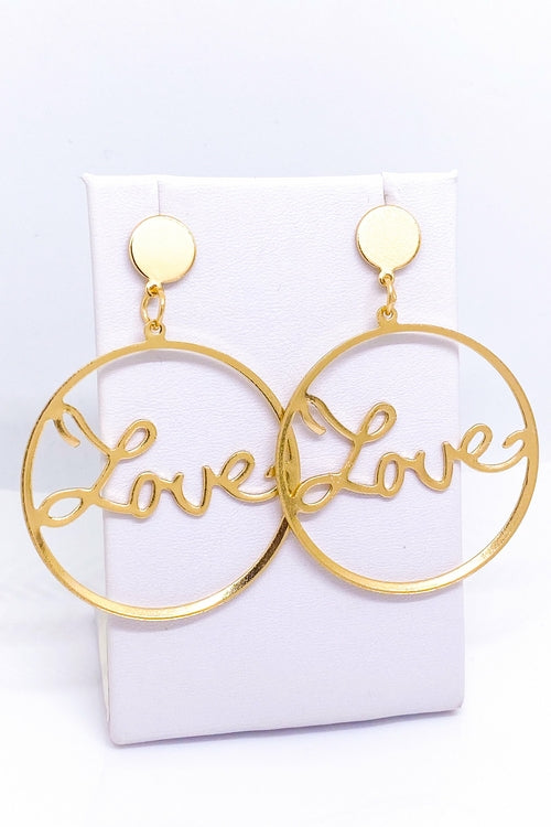Burgundy Uranus Love Earrings with gold-toned hoops featuring heart-shaped design on a white background
