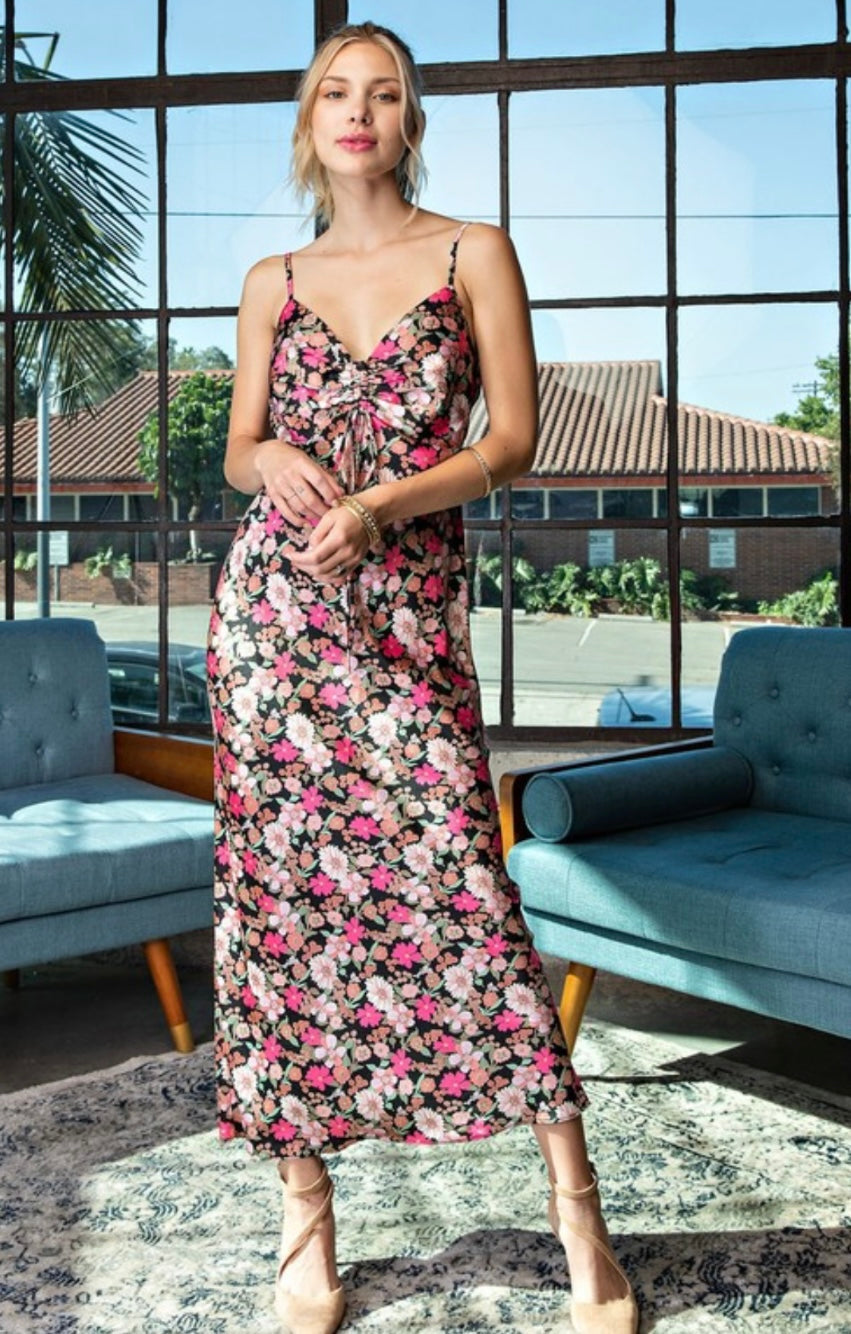 Carmine Pontus Serena floral maxi dress for women, featuring a flowing fabric with vibrant floral patterns and a elegant design