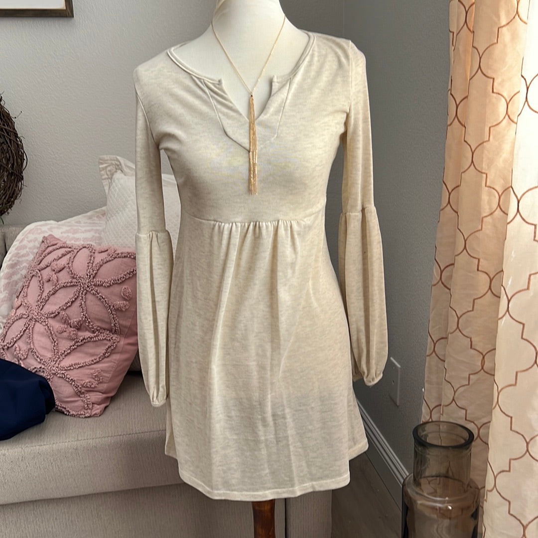 Ivory heathered knit dress for women by Ochre Ismene, featuring a cozy, textured fabric and a stylish, relaxed fit.