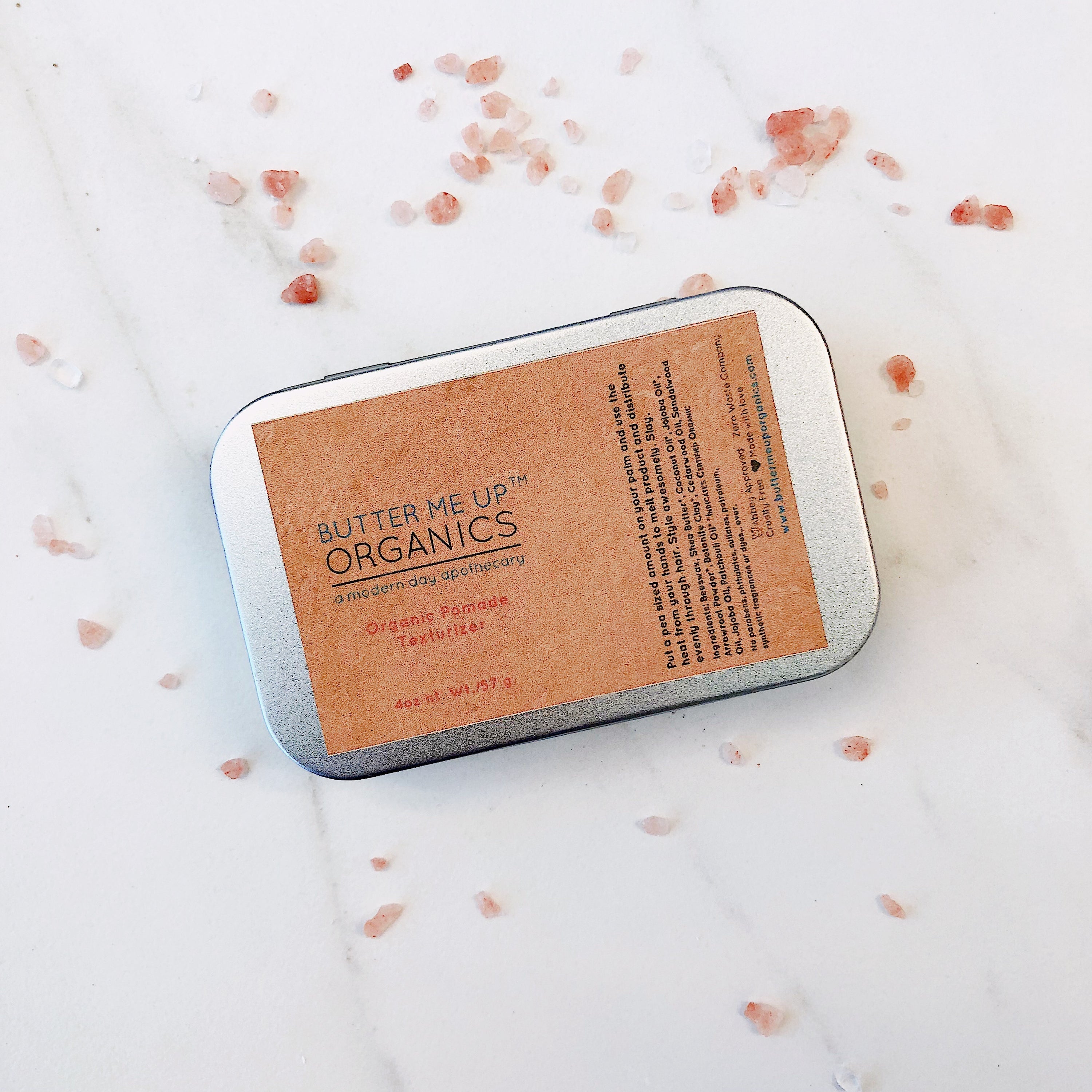 White Smokey Organic Pomade Hair Wax styling gel in a jar with a black lid, showing the product&