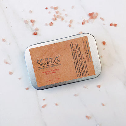 White Smokey Organic Pomade Hair Wax styling gel in a jar with a black lid, showing the product&