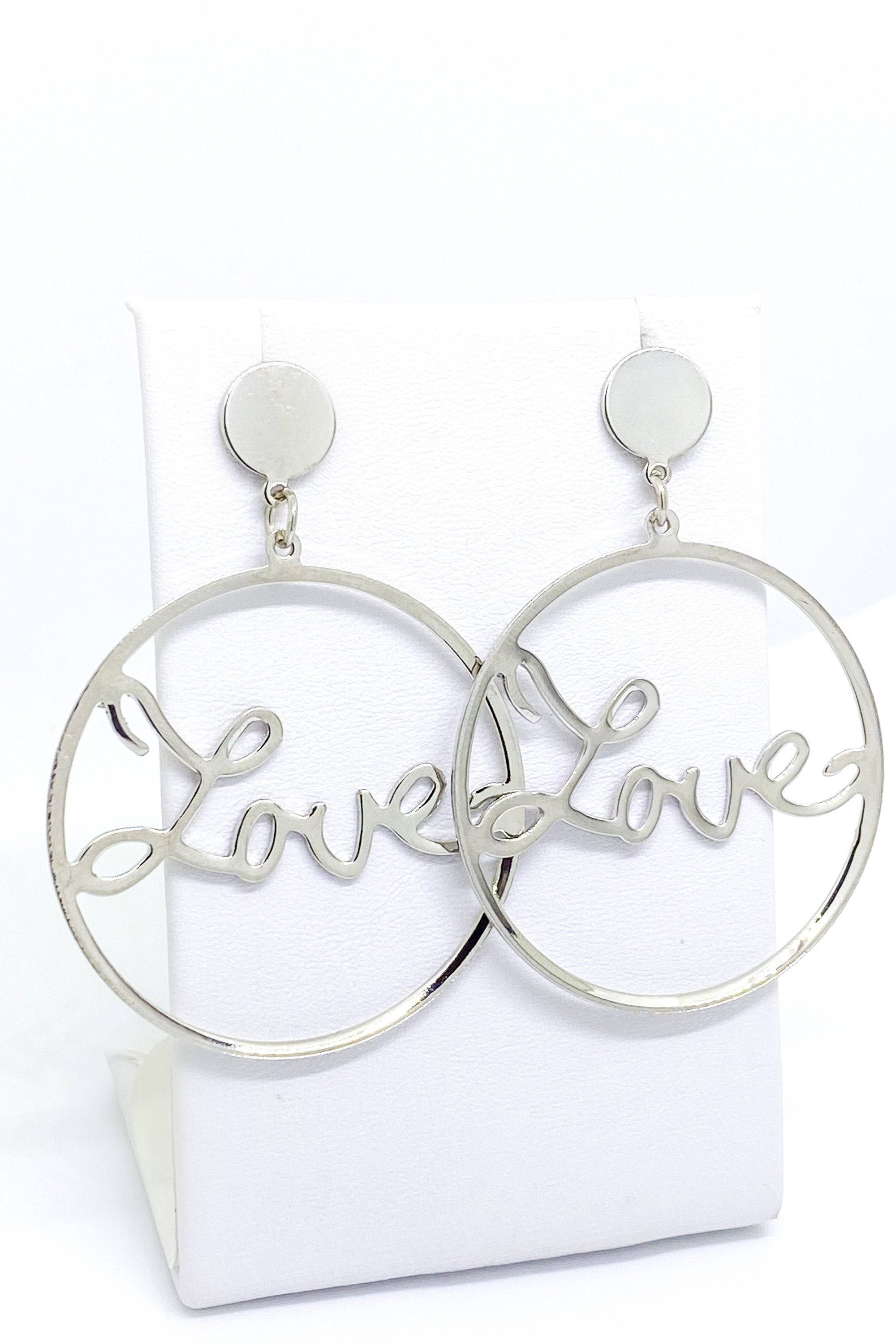 Burgundy Uranus Love Earrings, gold hoop earrings with heart-shaped charms, stylish jewelry for women.