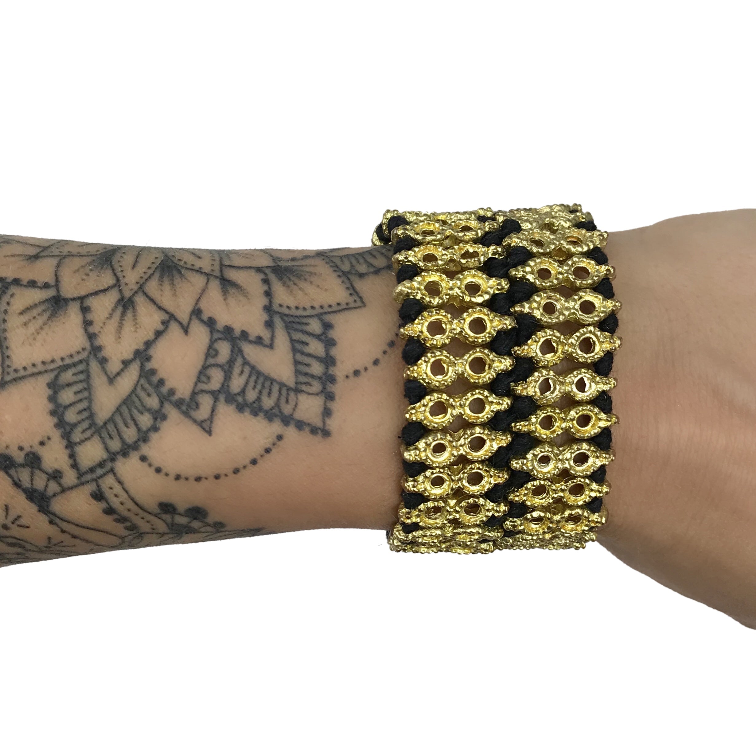 Ariel Riya Cuff bracelet featuring intricate Indian-inspired design and detailed metalwork on a stylish bracelet.