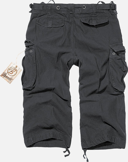 Callisto Industry 3/4 Cargo Shorts showing multiple pockets and durable fabric in a casual outdoor setting.