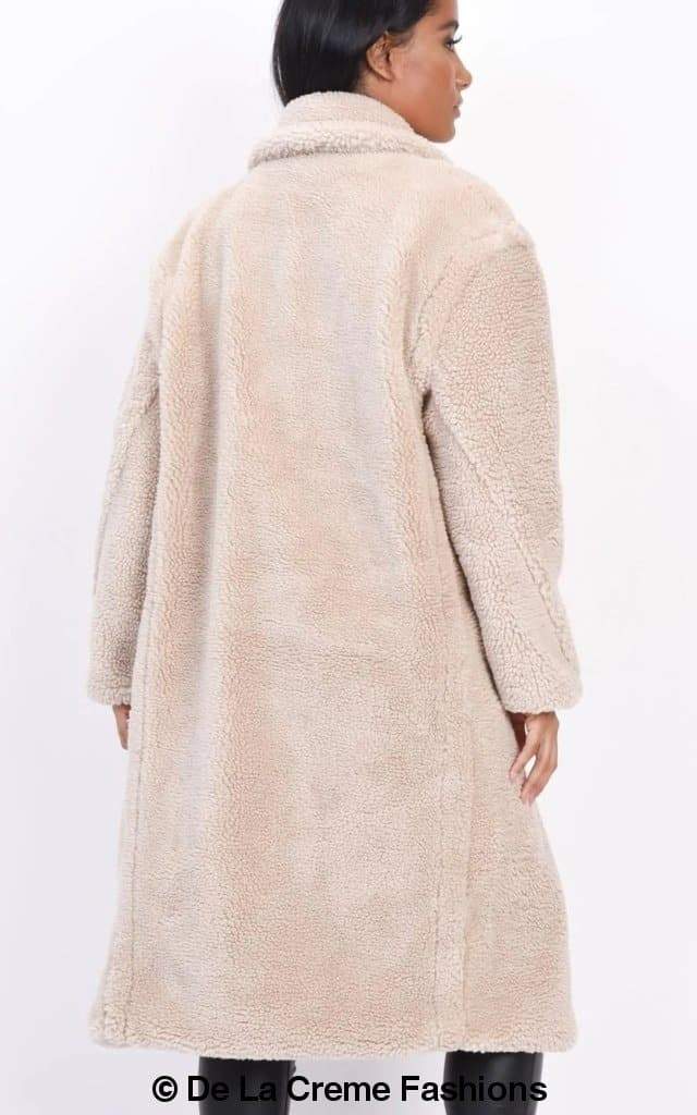 Rose Eleusis Jackie double-breasted borg teddy midi coat with plush fabric and tailored fit, displayed on a hanger.