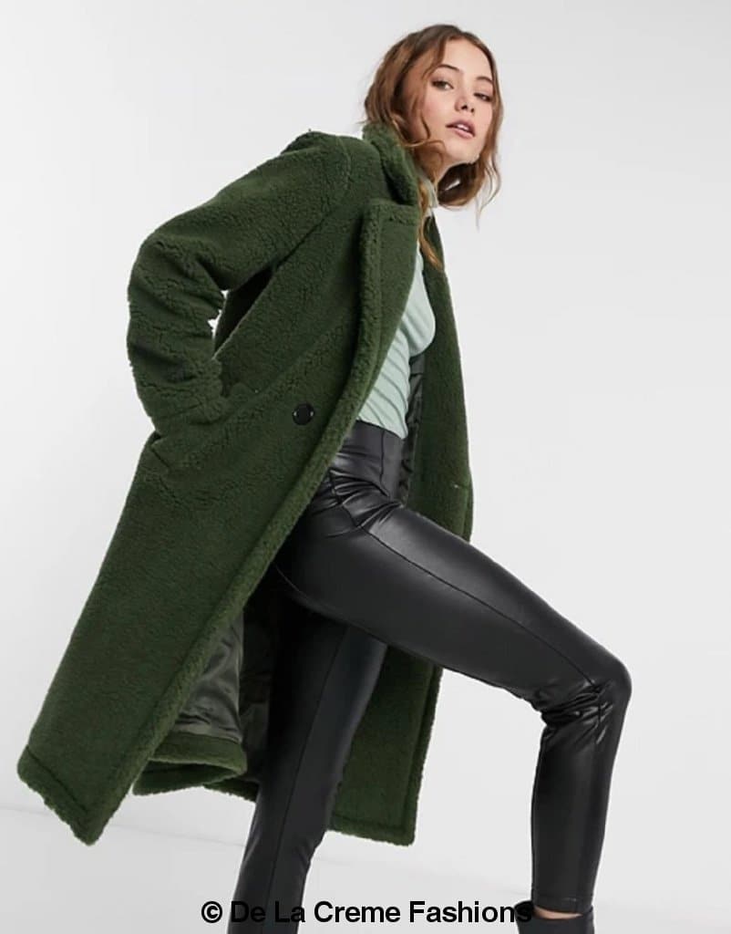 Rose Eleusis Jackie double-breasted borg teddy midi coat with cozy fleece interior and stylish design, shown on a hanger.