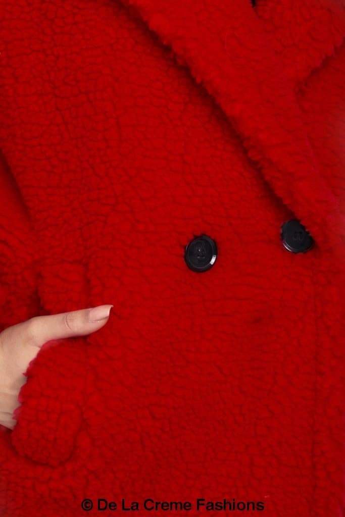 Rose Eleusis Jackie double-breasted borg teddy midi coat featuring a cozy, plush fabric and classic design, perfect for cold weather.