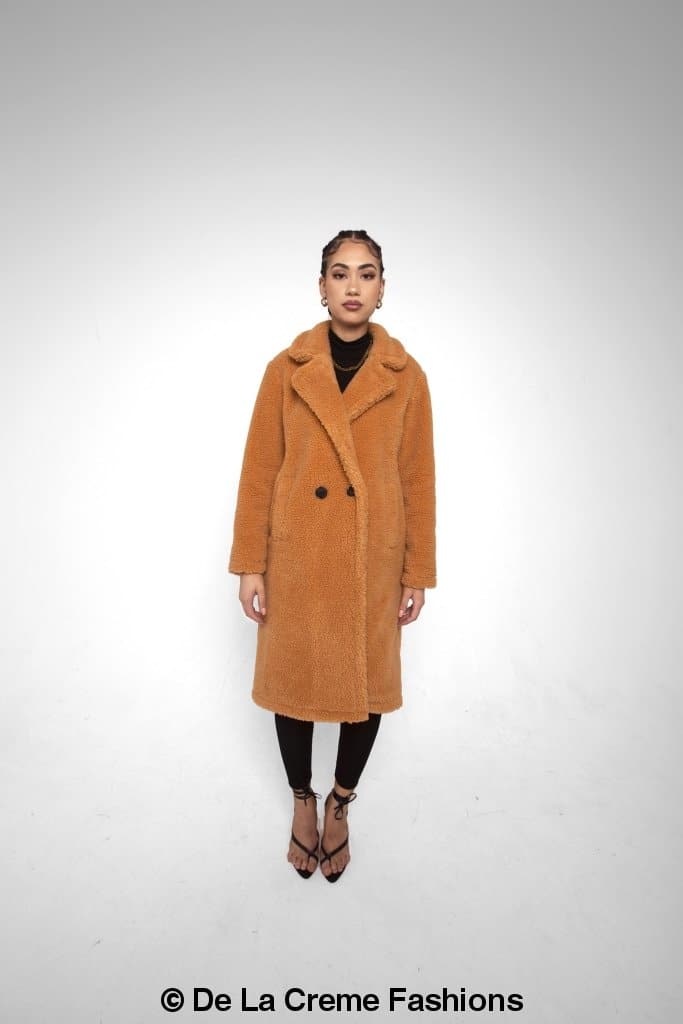 Rose Eleusis Jackie double-breasted borg teddy midi coat shown on a model, featuring a cozy, oversized fit and classic design.