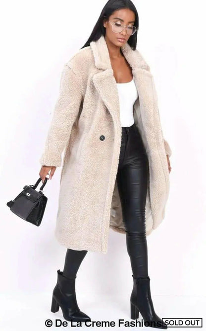 Beige Jackie double-breasted Borg teddy midi coat by Rose Eleusis, featuring cozy fleece lining and stylish lapel collar.