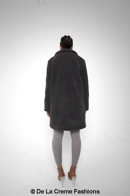 Rose Eleusis Jacqueline oversized teddy coat shown in soft, plush fabric with a cozy, stylish fit and large collar.