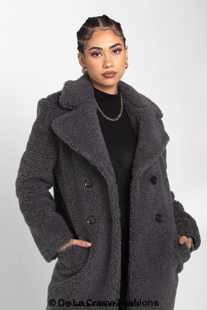 Rose Eleusis Janine double-breasted Borg teddy coat with plush fabric, shown on a model wearing a stylish winter jacket.