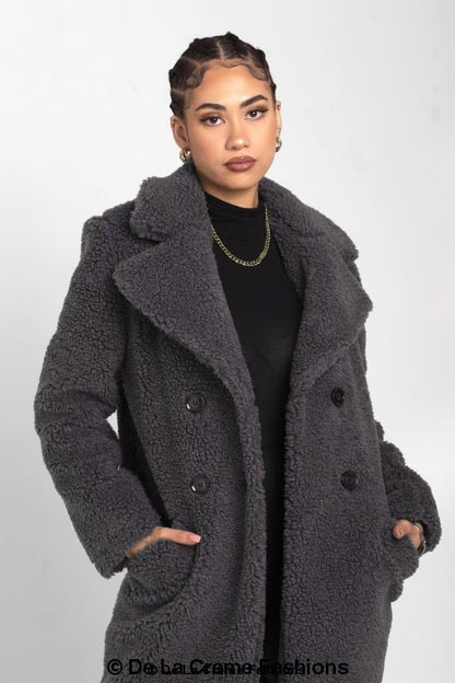 Rose Eleusis Janine double-breasted Borg teddy coat with plush fabric, shown on a model wearing a stylish winter jacket.