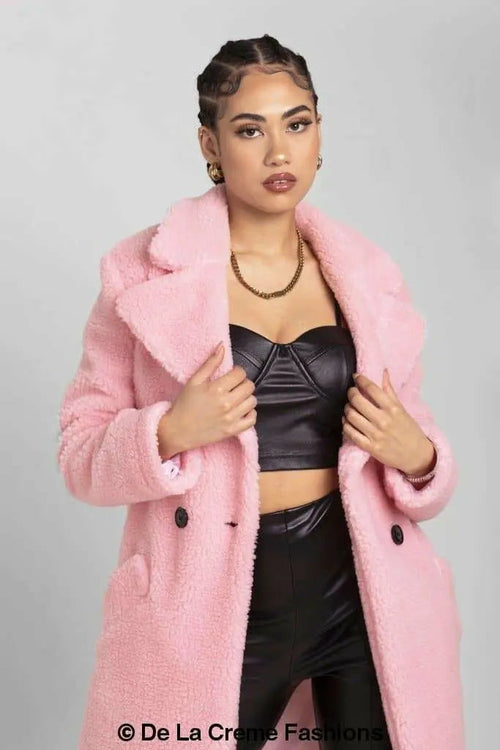 Pink Janine double-breasted borg teddy coat by Rose Eleusis, cozy warm jacket with lapel collar and button details.