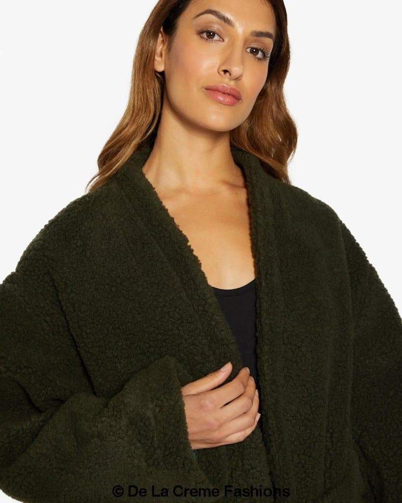 Jenna wearing Rose Eleusis open front belted teddy coat, cozy plush fabric, and stylish lapel collar, perfect for cold weather.
