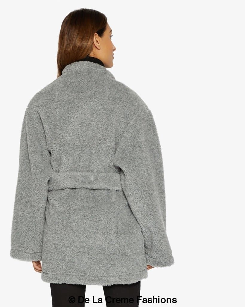 Jenna wearing Rose Eleusis open front belted teddy coat with cozy collar and pockets, stylish and warm for cold weather.