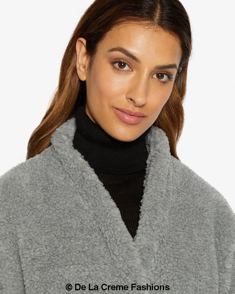 Jenna wearing Rose Eleusis open front belted teddy coat with a soft, plush fabric and relaxed fit in a cozy jacket style.