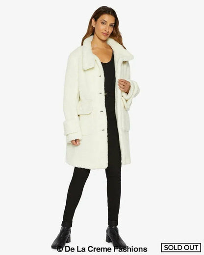 Cream Julie high neck Borg teddy coat by Rose Eleusis, featuring soft fleece material and cozy, stylish design.