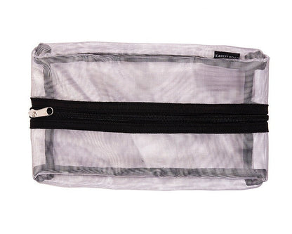 Silver mesh makeup case by Erin Crius with zipper closure and compact design, perfect for storing cosmetics.