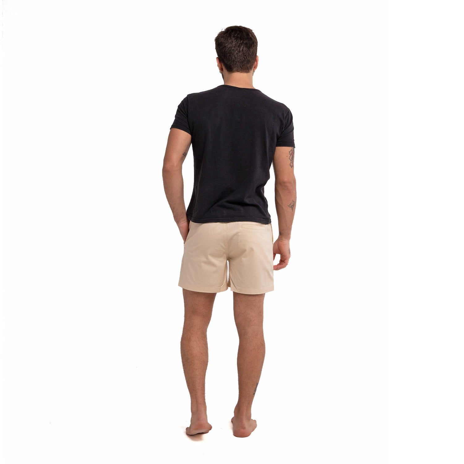 Khaki cotton swim shorts by Ruby Tartarus featuring a relaxed fit and casual style for comfortable beachwear.