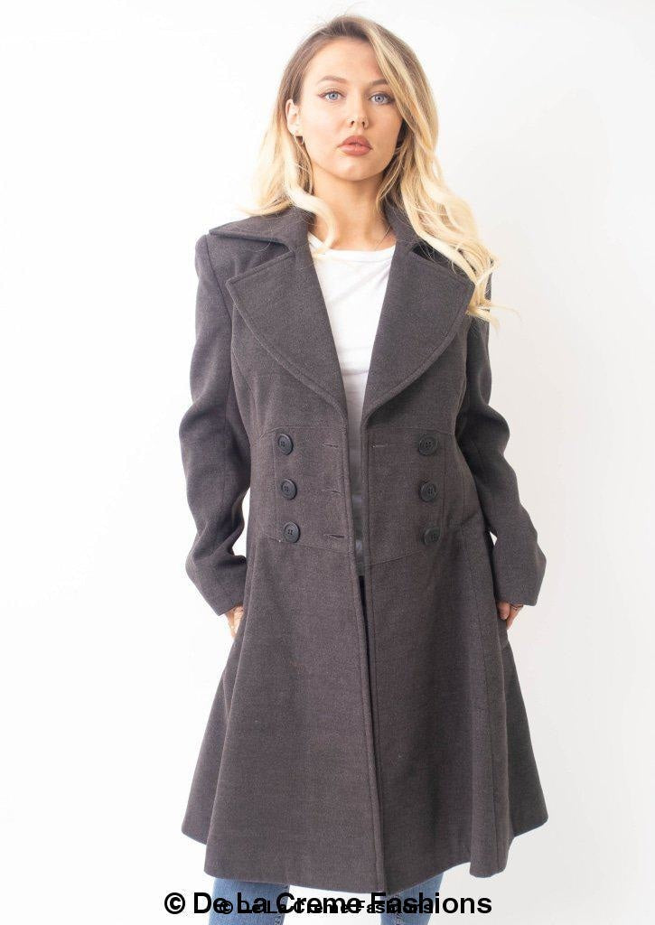 Rose Eleusis Kirsty Slim Fit A-Line Coat hanging on a clothing rack, showcasing its tailored fit and classic design.