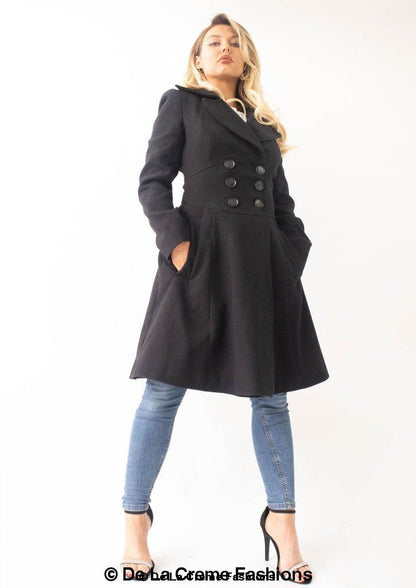 Black Kirsty Slim Fit A-Line Coat by Rose Eleusis, shown on a mannequin, featuring a tailored silhouette and classic coat design.