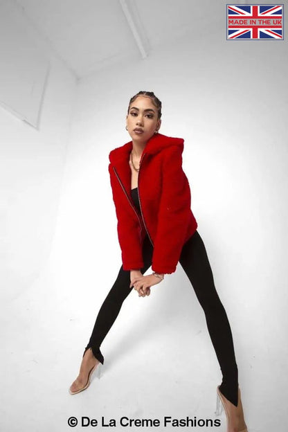 Rose Eleusis Lauren zip-up hooded borg teddy jacket in red, featuring a cozy fleece-lined design with a hood and front zipper.