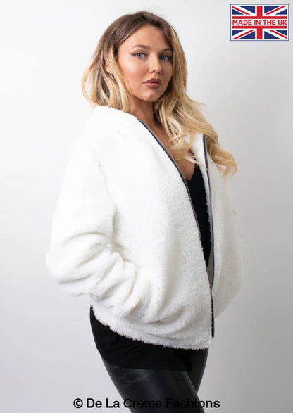 Rose Eleusis Lauren zip-up hooded Borg teddy jacket in white, shown on a model, featuring a cozy fleece-lined design.