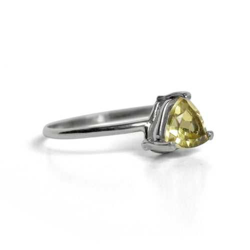 Sterling silver Lemon Topaz trillion solitaire ring by Grey Clymene, showcasing a vibrant yellow gemstone set in a sleek band.