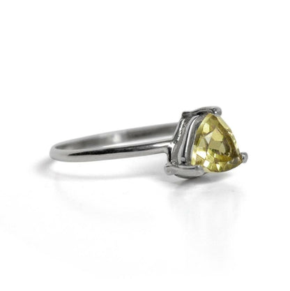 Sterling silver Lemon Topaz trillion solitaire ring by Grey Clymene, showcasing a vibrant yellow gemstone set in a sleek band.