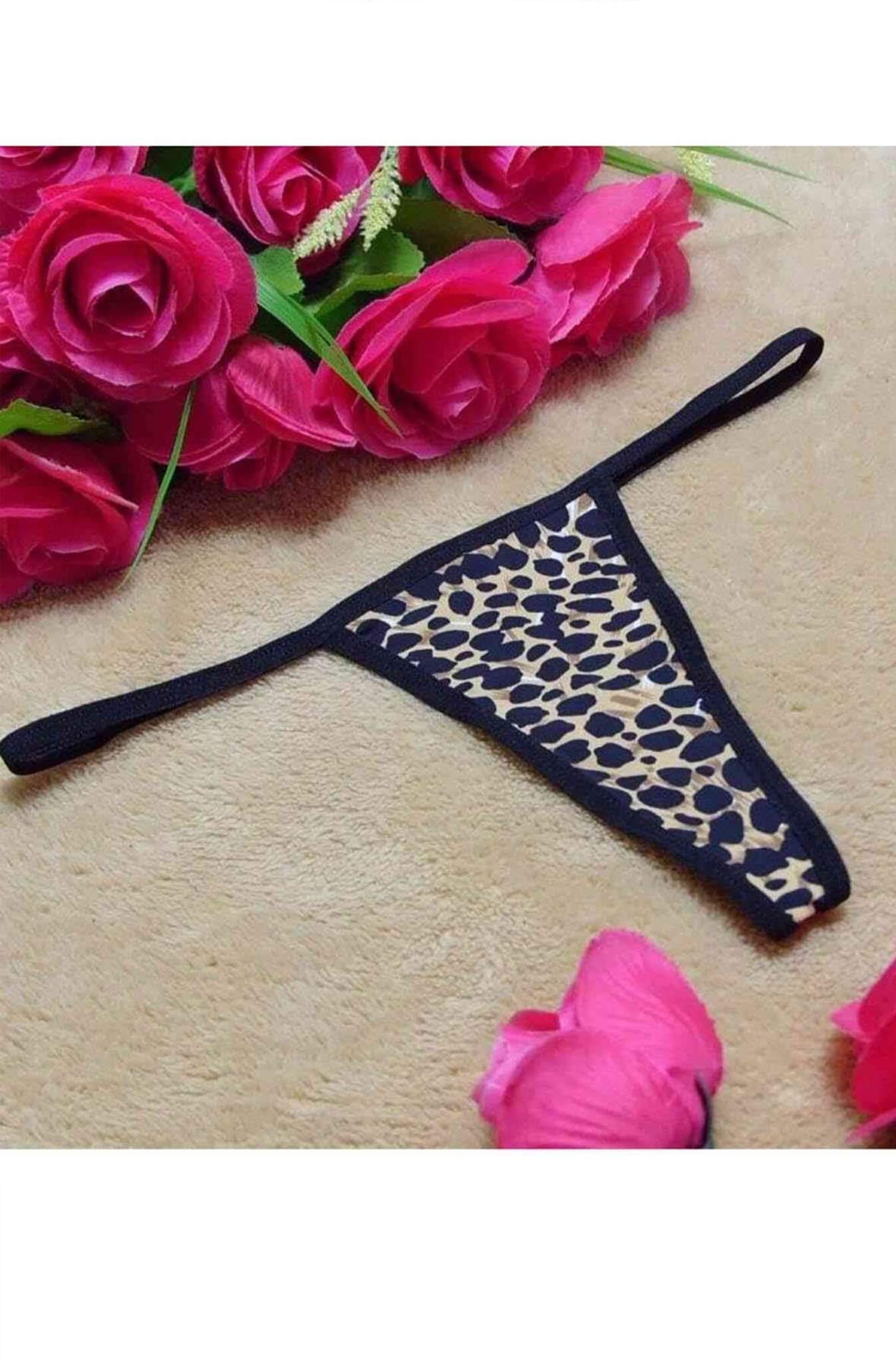 Harlequin Icarus leopard thong panties for women, showcasing a stylish leopard print with a comfortable fit and minimal coverage.