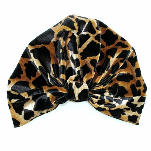 Leopard print Stretch Velvet Turban by Cyan Ismene, a stylish haircare accessory with a soft, luxurious velvet fabric and bold pattern.