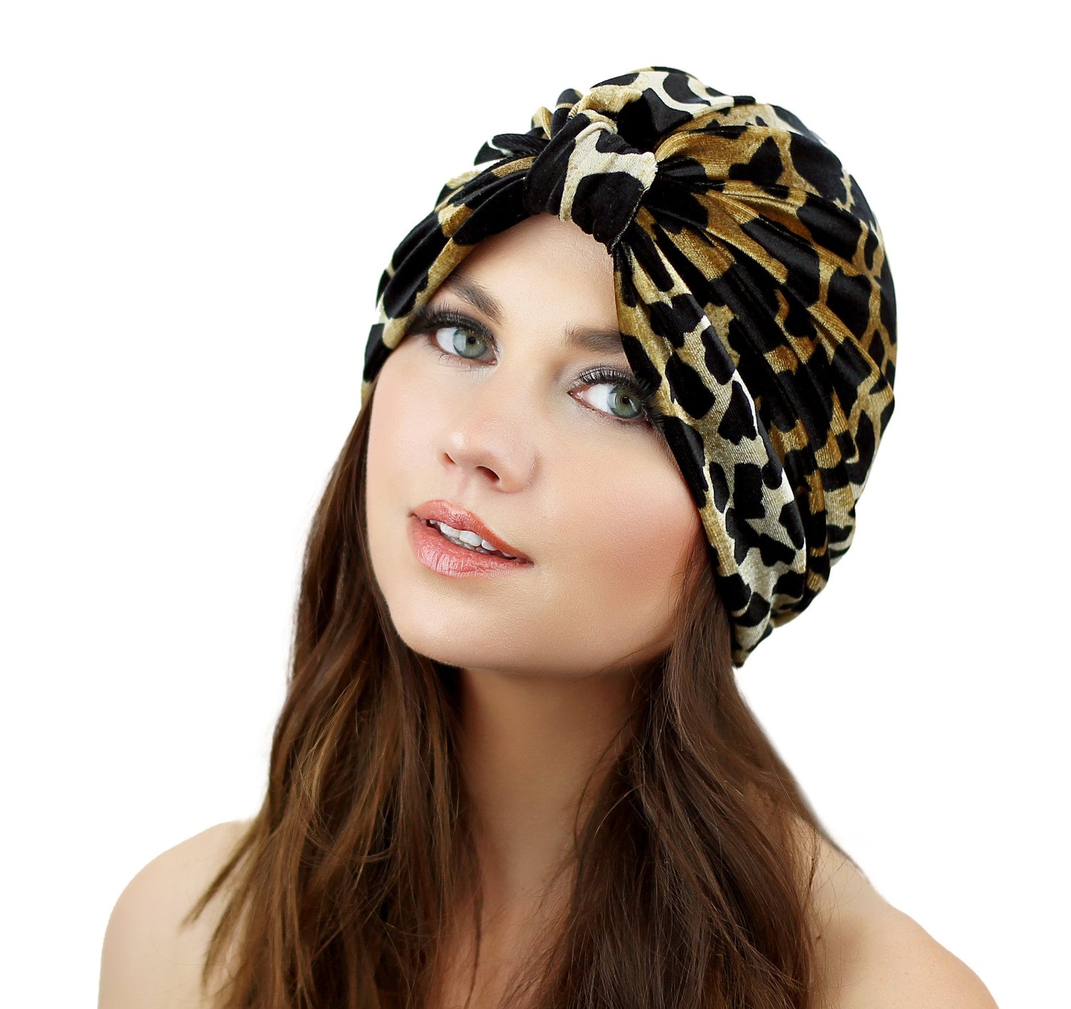 Leopard print Stretch Velvet Turban by Cyan Ismene, a stylish haircare accessory showcasing a soft, luxurious fabric and bold animal print.