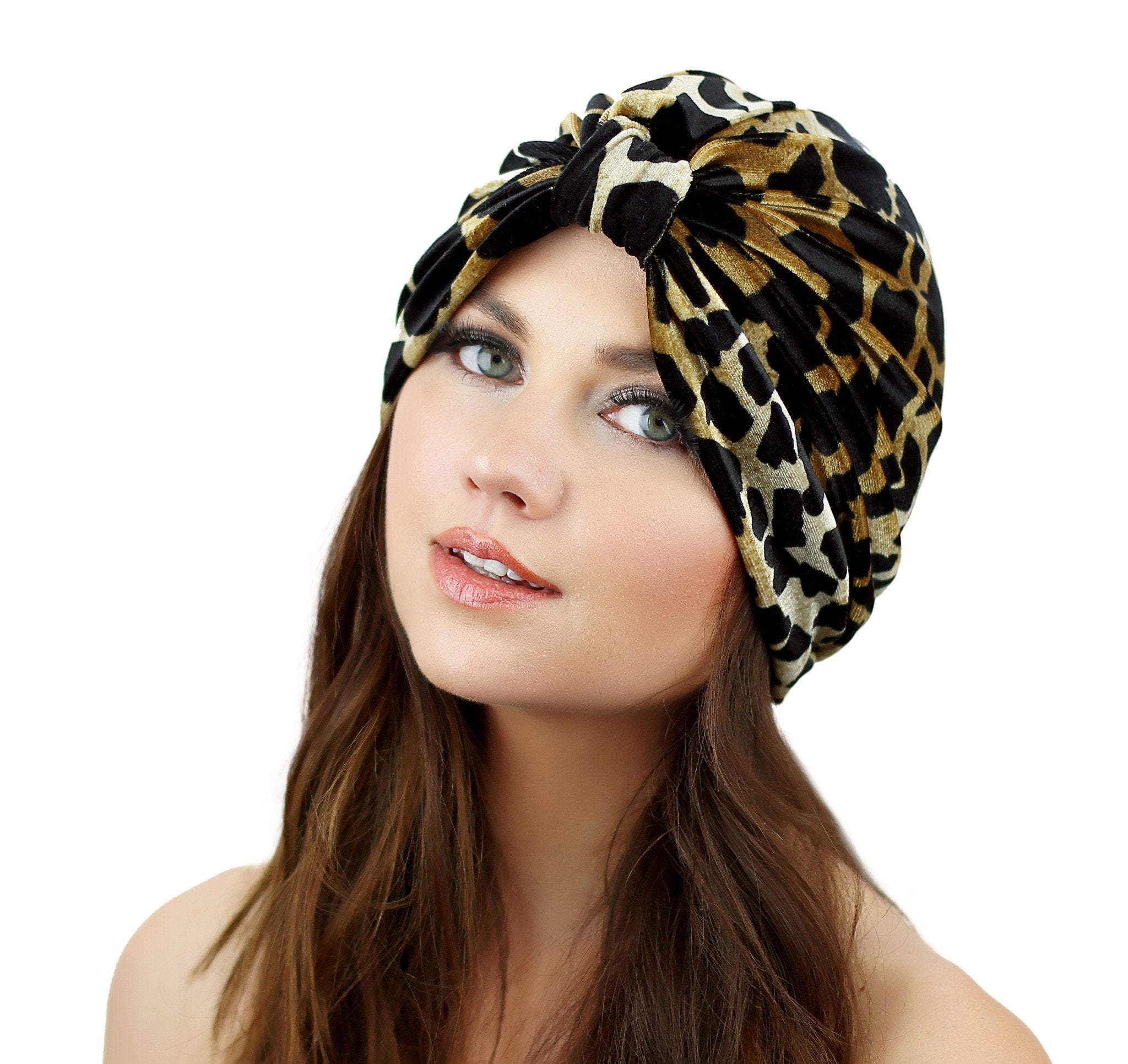 Leopard print Stretch Velvet Turban by Cyan Ismene, a stylish haircare accessory showcasing a soft, luxurious fabric and bold animal print.