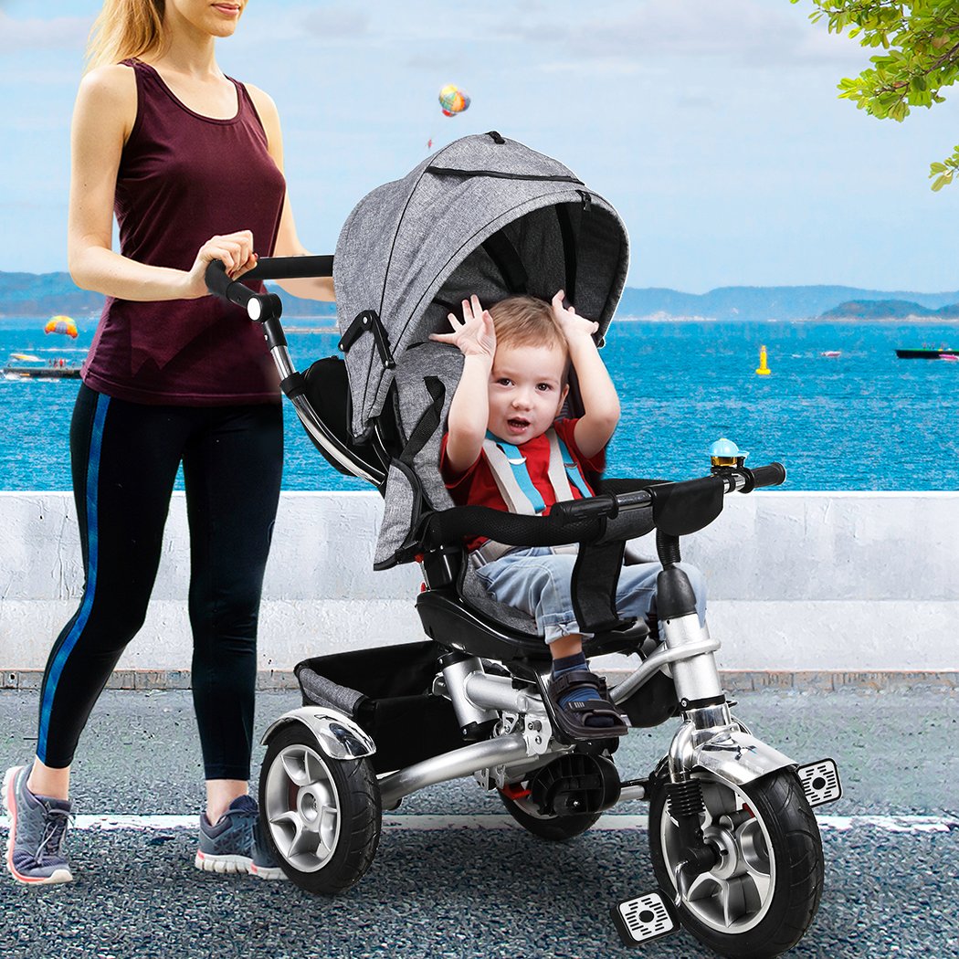 Ultramarine Dione BoPeep 5-in-1 kids tricycle and walker for toddlers, shown outdoors with a child riding and playing.