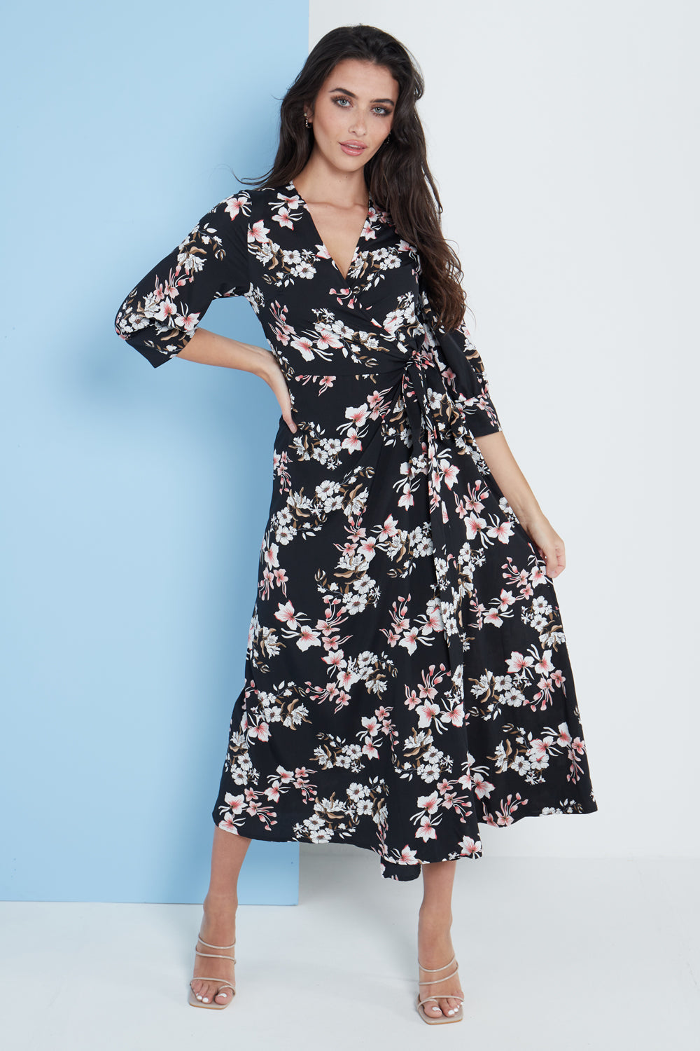 Black floral print midi wrap dress for women by Amethyst Millie, featuring a stylish and elegant wrap design.
