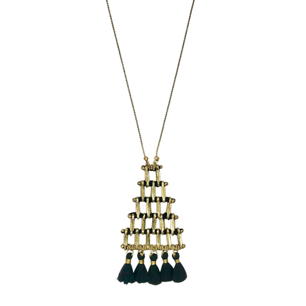 Ariel Kai Pyramid Necklace featuring a long gold chain with a pyramid-shaped pendant, styled as elegant jewelry.
