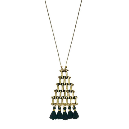 Ariel Kai Pyramid Necklace featuring a long gold chain with a pyramid-shaped pendant, styled as elegant jewelry.