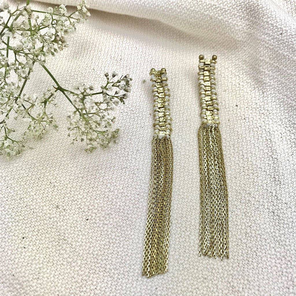 Ariel Temple Tassel Earrings featuring long gold tassels and elegant earring design for a statement jewelry look.