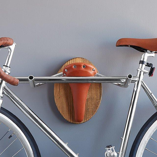 Pinwheel Bike Rack Bicycle Taxidermy "The Longhorn" mounted on wall, decorative home and garden accessory featuring a longhorn design.