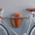 Pinwheel Bike Rack Bicycle Taxidermy "The Longhorn" mounted on wall, decorative home and garden accessory featuring a longhorn design.