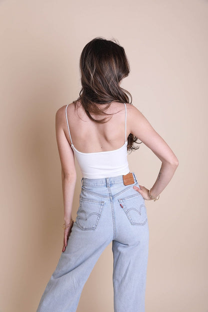 Periwinkle Aether low-back brami in soft fabric, featuring a stylish cut and delicate straps for comfortable lingerie wear.