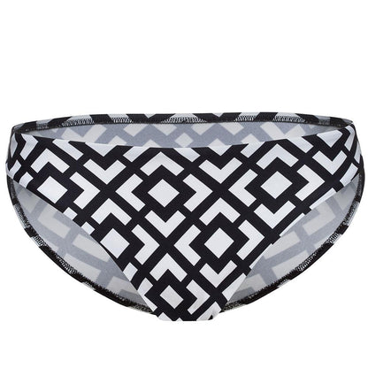 Lime Lucy Lauma Beach Party low-rise bikini bottom, turquoise swimwear with tie sides, perfect for beach or poolside lounging.